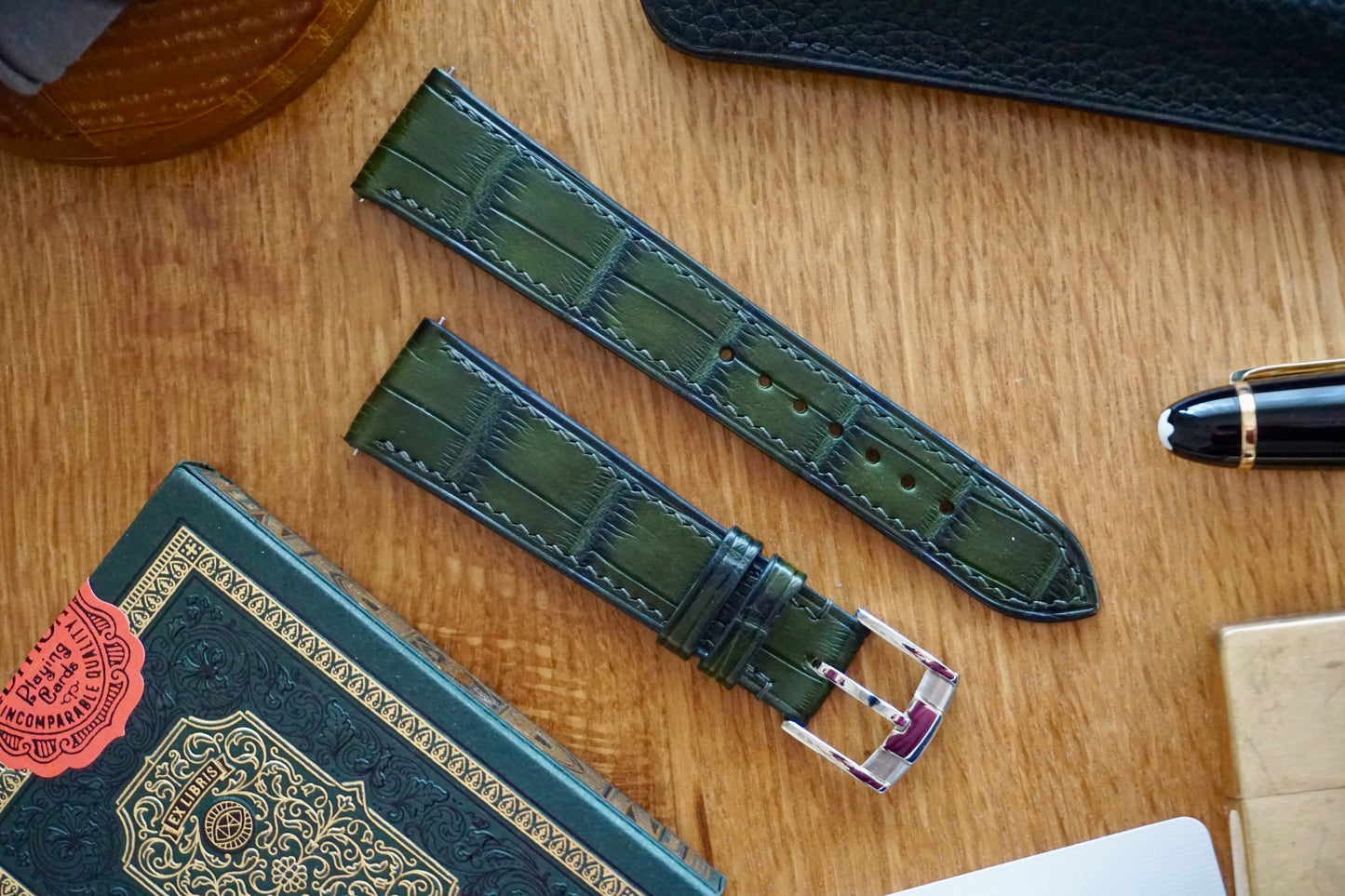 Crocodile leather in patinaed deep green watch strap.