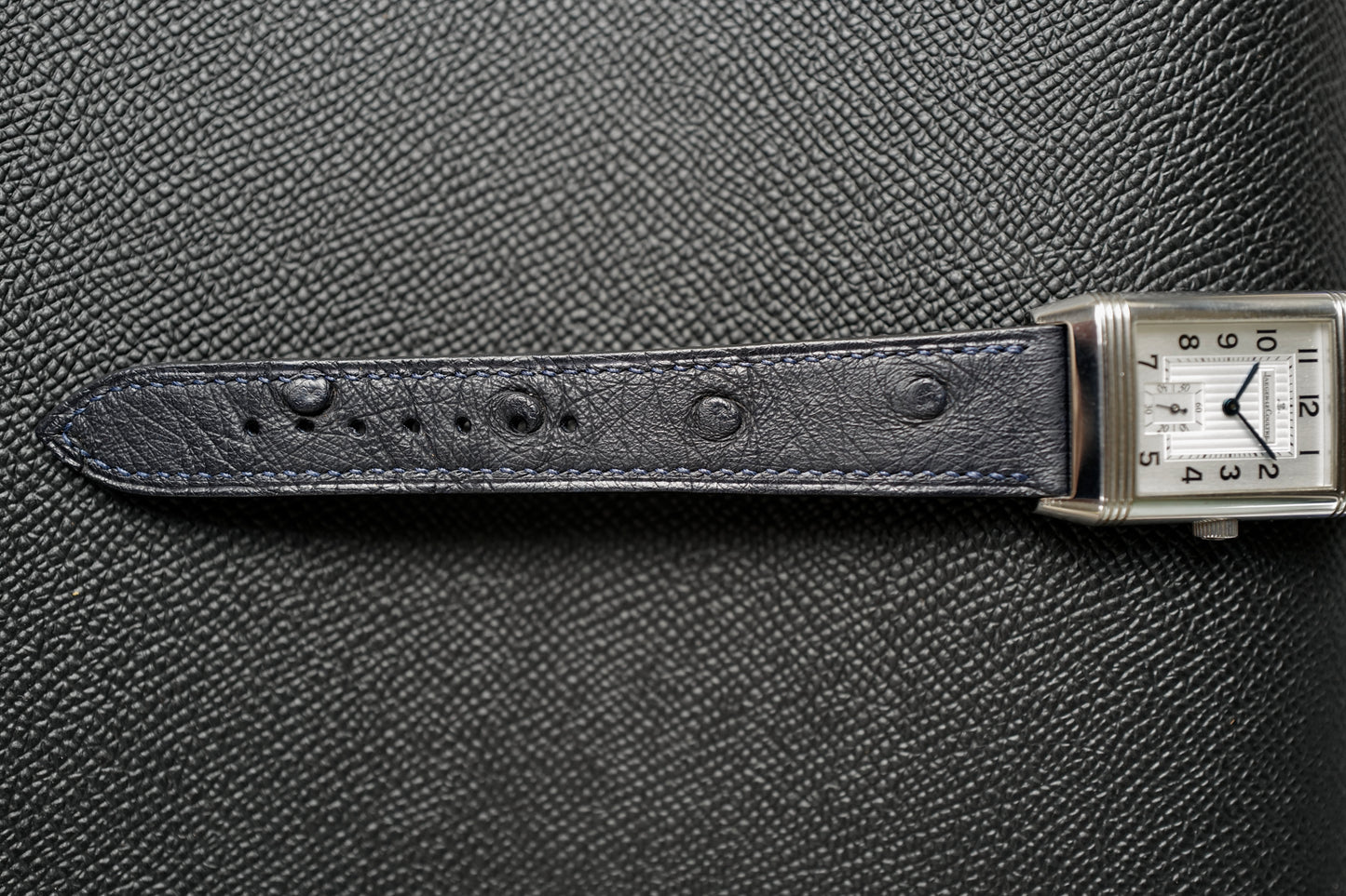 Navy blue Ostrich Leather strap.