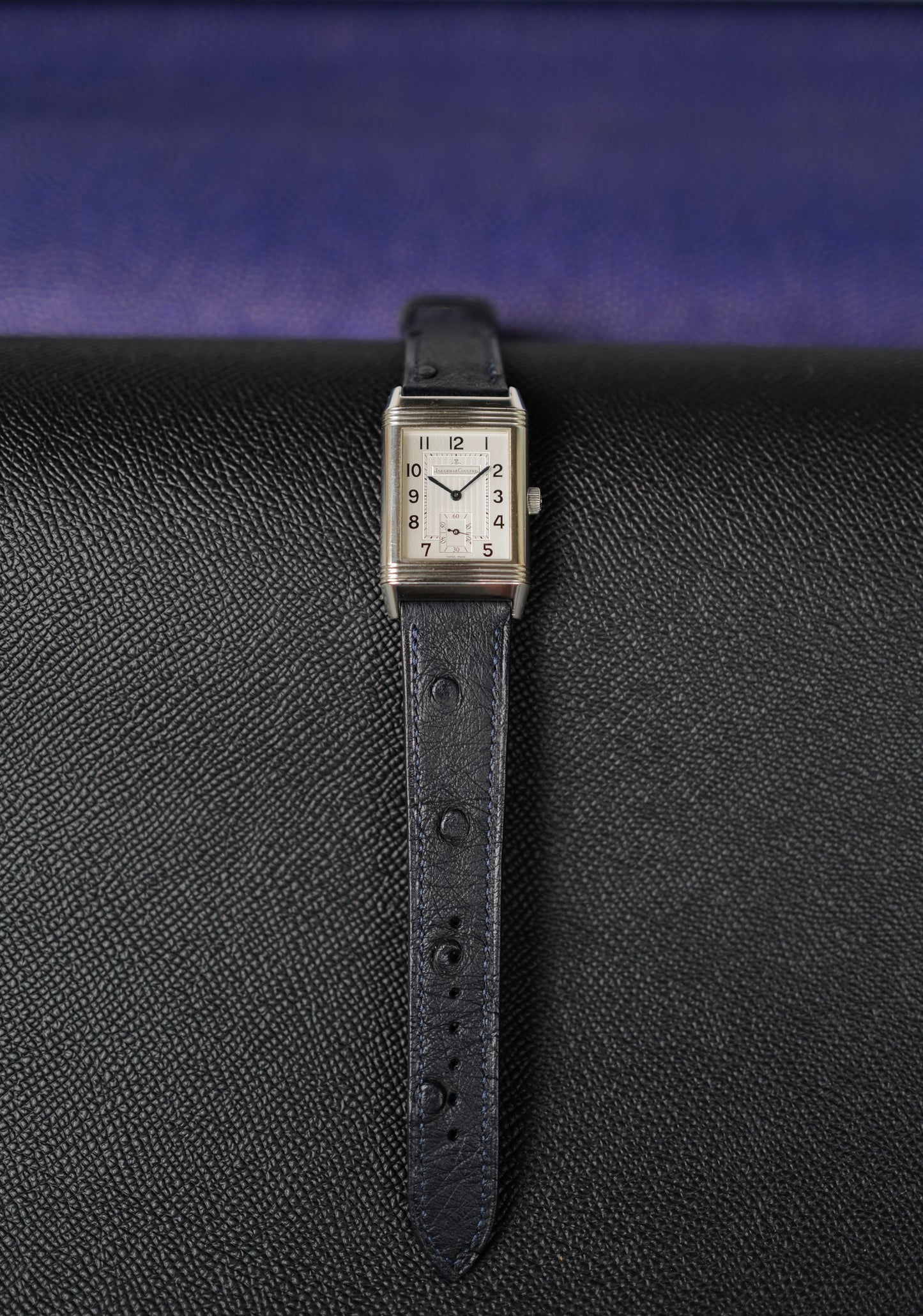 Navy blue Ostrich Leather strap.