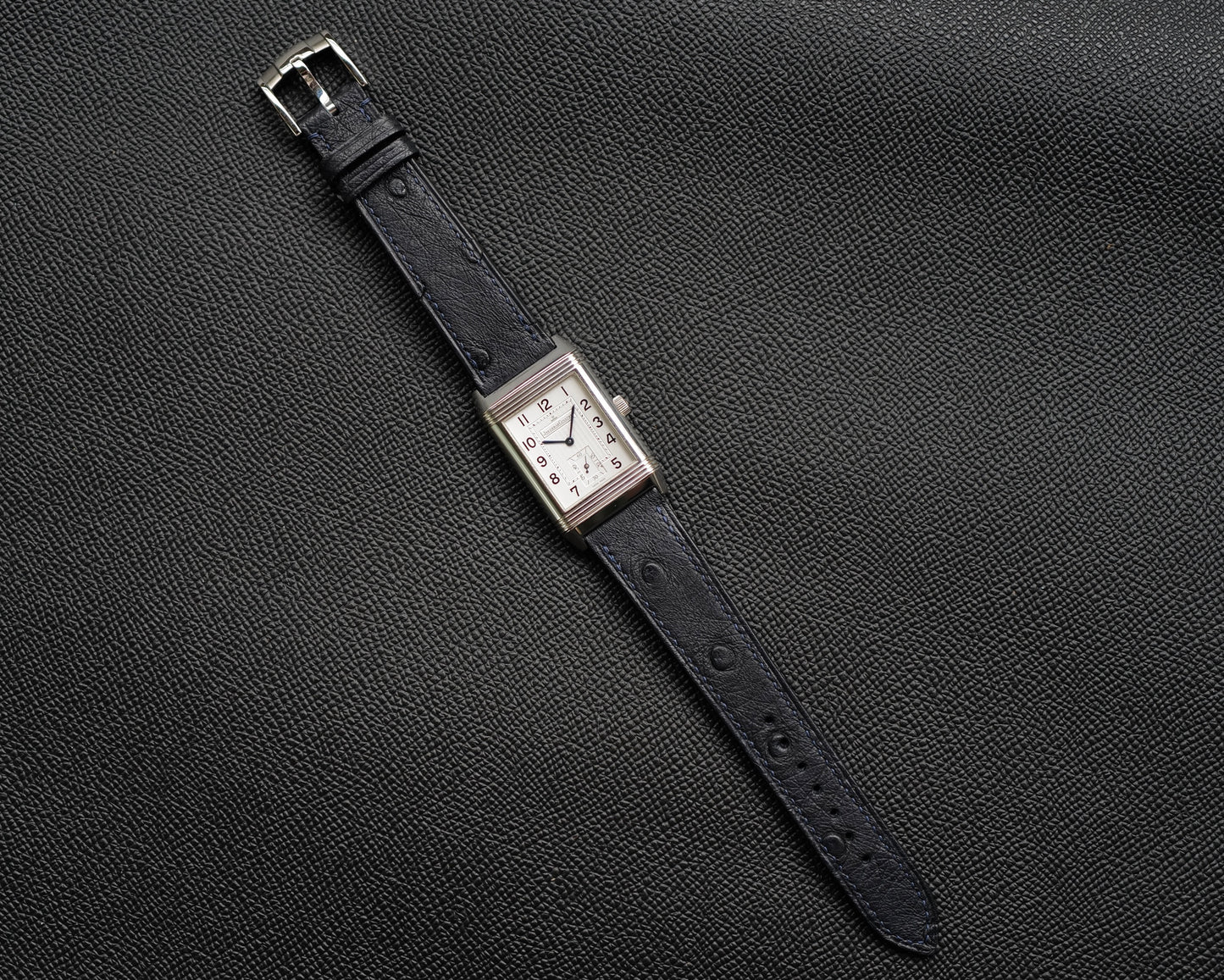 Navy blue Ostrich Leather strap.